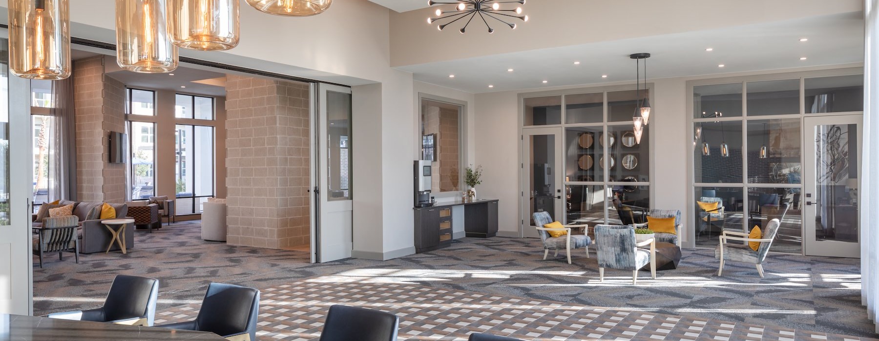 a large room with a large dining table and chairs