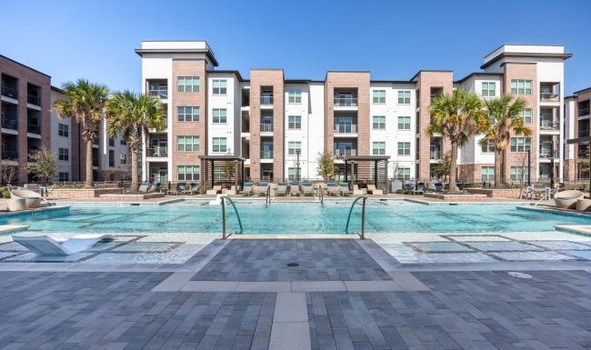 a pool in front of a building